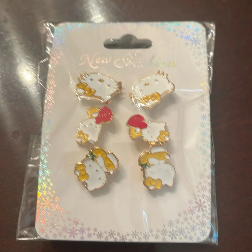 Hello Kitty nwt Earrings Set - three pairs yellow and gold tone